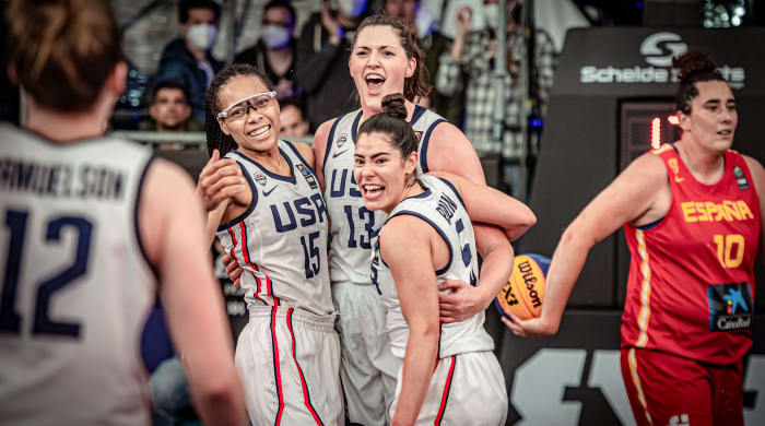 Allisha Gray, Stefanie Dolson and Kelsey Plum embrace